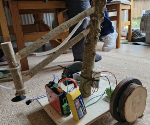 Robot with arm made from sticks